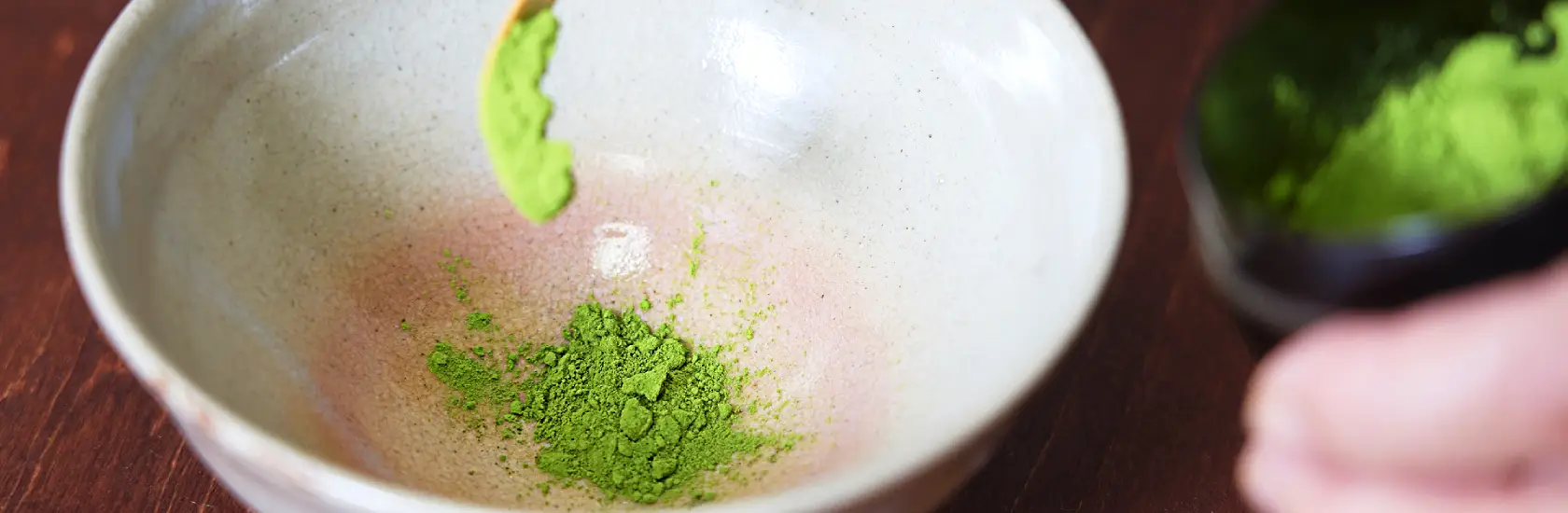 Finely ground powder green tea, perfect for whisking into a vibrant and refreshing beverage or for culinary uses.